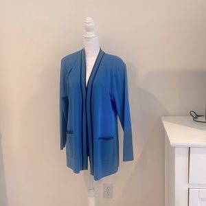 Beautiful Misook cardigan black pipe in downtown front a gorgeous blue